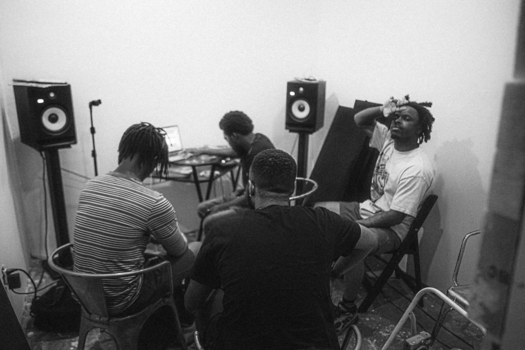 a group of people sitting in chairs in a room